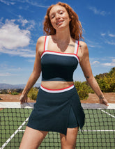 blue spacedye wrap mini skirt with white and red outline along the waistband and a front slit.